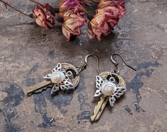 Vintage brass key butterfly and shell earrings