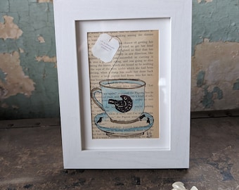 Marcos originales cuervo taza de té libro página arte