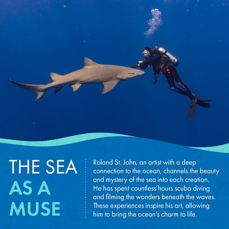 May include: An underwater scene featuring a diver interacting with a shark in a deep blue ocean. The diver is wearing a black wetsuit and scuba gear. The text "THE SEA AS A MUSE" is displayed in white letters.