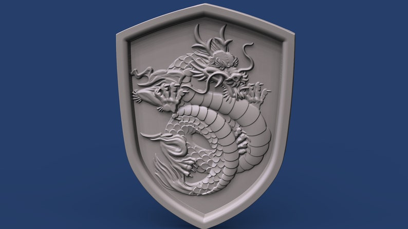May include: A gray, three-dimensional, sculpted dragon coiled around itself, with its head facing forward, is displayed on a gray shield.