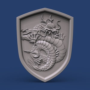 May include: A gray, three-dimensional shield with a detailed carving of a coiled dragon.