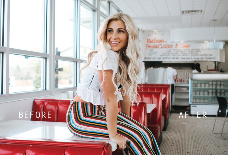 May include: A woman with long blonde hair sits on a red booth in a diner. She is wearing a white crop top and colorful striped pants. The diner has large windows and a sign that says "Welcome Fresh Cooked & Diner".