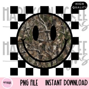 May include: A digital graphic design featuring a circular smiley face with a camouflage pattern of brown leaves and branches. The smiley face has two solid black oval eyes and a curved black mouth, centered over a black and white checkered square.