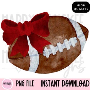 May include: A brown and white football with a red bow on top. The football is painted in a watercolor style.