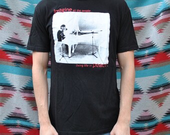 T-shirt Officiel John Lennon 'Gibson' - Homme & Femme - Bleu - Licencié Rock Off