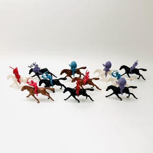 11 1960’s Ajax Plastics Miniature Horses and Indians