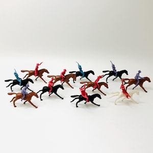 11 1960’s Ajax Plastics Miniature Horses and Cowboys