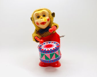 Vintage Tin Toy Drumming Monkey by Clockwork