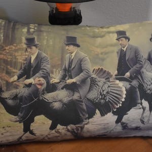 Fun men in antique clothing riding Thanksgiving turkeys pillow