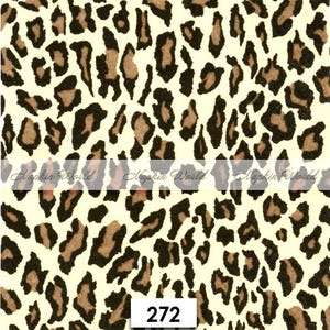 May include: A repeating pattern of leopard spots in black, brown, and tan on a cream background. The text "Napkin World" is visible in a banner across the image, and the number "272" is in a white box at the bottom.