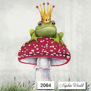 May include: A green frog wearing a gold crown sits atop a red and white mushroom with white spots. The mushroom has a white stem. The background is a light gray with a subtle texture. The image includes the text "Napkin World" and "2064".