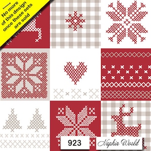 May include: A set of 9 red and white Christmas napkins with different cross-stitch designs, including a snowflake, heart, reindeer, and tree. The napkins are labeled "923 Napkin World".