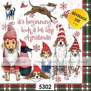 May include: A set of six paper napkins featuring a festive Christmas design with dogs wearing Santa hats. The napkins have a red and green plaid border and the text "it's beginning to look a lot like christmas". The napkins are 5 inches by 5 inches.