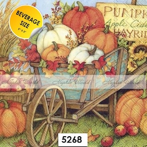 May include: A decorative image featuring a rustic wooden cart filled with pumpkins in shades of orange and white, surrounded by fall foliage. The image includes a sign that reads "PUMPKIN Apple Cider HAYRIDE". A yellow sticker indicates the size is 5" x 5".