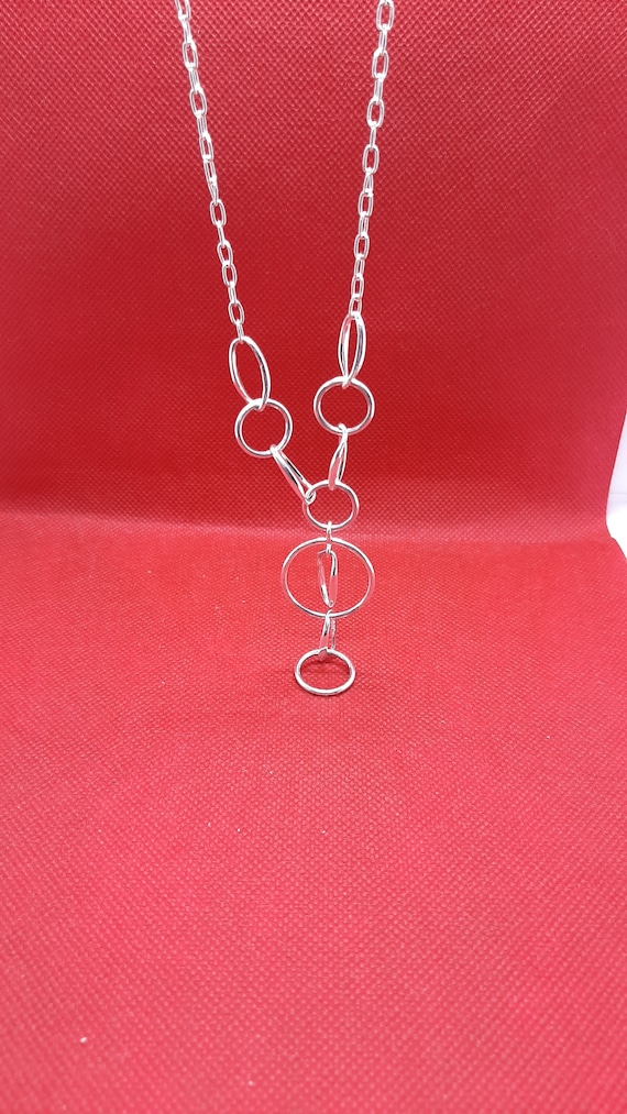 Silver dangling circle necklace