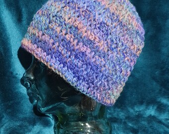 Wool and alpaca mix, adult beanie or hat (sized to fit large to XL) in mauve and blue rainbow tones.