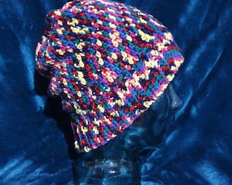 Unisex, hand crocheted, rainbow slouch hat to fit medium size adult.