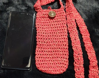 Hand crocheted mobile phone holder or carrier available in different colours.