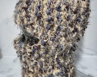 Stylish unisex, crochet ski mask or balaclava in blue, brown and beige tones sized to fit a large adult.