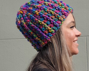 Adult beanie (size small to medium) in stunning rainbow tones made in easycare acrylic yarn.