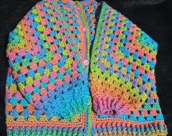 Hand crocheted, toddler or child's cardigan in rainbow tones sized to fit 2 to 4 years old.