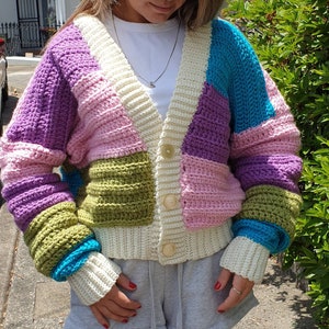 Hand crocheted, retro style, puffy striped rainbow cardigan in easycare acrylic wool mix yarn.