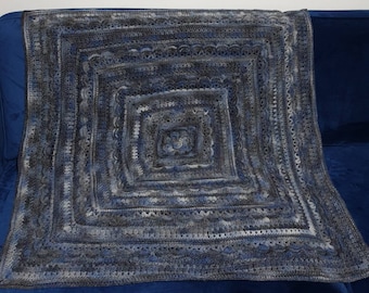 Heirloom afghan, woollen blanket or throw in blue and grey tones.