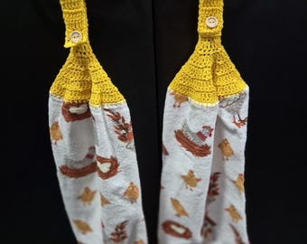 Hand Crocheted bird designs tea towels with matching cotton toppers.