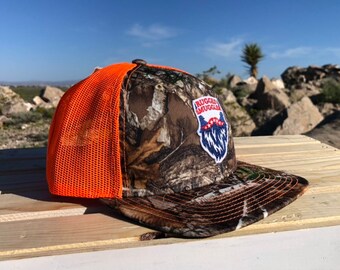 Orange Camo Trucker Hat - Contrebandier robuste