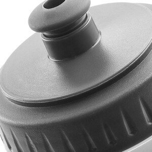 May include: Close-up of a gray plastic water bottle cap with a textured surface and a small opening for drinking.