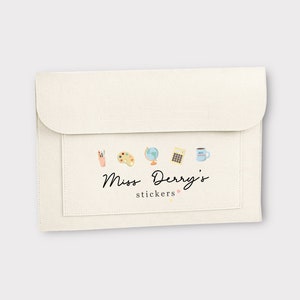 May include: A white felt laptop sleeve with a pocket on the front. The pocket has a row of small colourful icons, including a paint palette, a globe, a calculator, and a coffee mug. The text "Miss Derry's stickers" is printed below the icons.