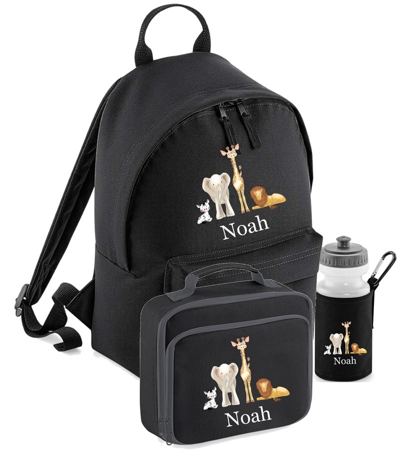 May include: Black backpack with a lunch bag and water bottle. The backpack and lunch bag have a design of a giraffe, elephant, lion, and a small animal. The name "Noah" is embroidered on the backpack and lunch bag.