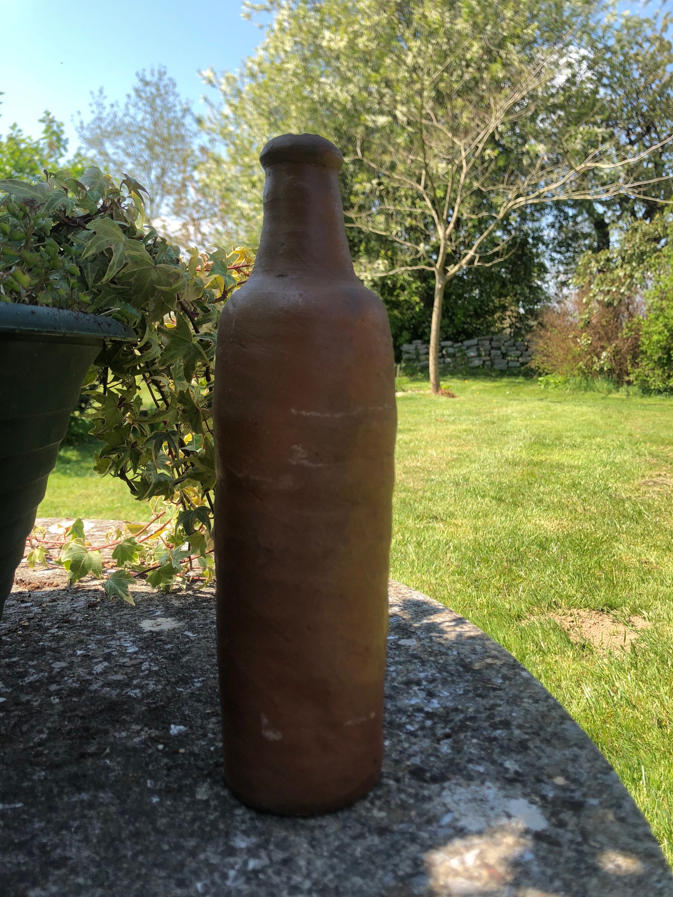 Ancienne Bouteille en Terre Cuite