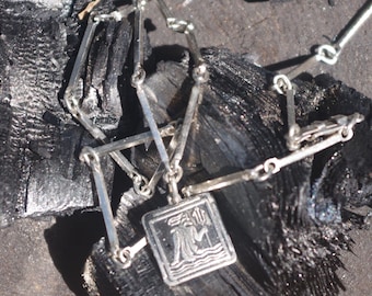 Waterman, een oude hanger met een stijlvolle ketting. Roestvrij staal.