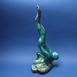 Diver, large ceramic figure. Swimming in art. Diving. Underwater world.