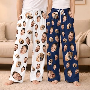 May include: Two pairs of lounge trousers featuring an all-over print of repeating faces of a person and a golden retriever dog. One pair is white and the other is navy blue. Both pairs have an elastic waistband with white drawstring ties.