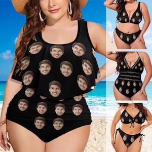 May include: A black swimsuit with a ruffled top and a high-waisted bottom. The swimsuit is covered in a pattern of faces.