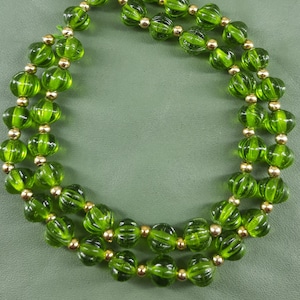 Green Peridot Gemstone Beads: 8&quot; Carved Watermelon Rondelle Strand