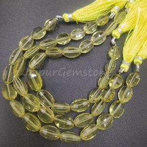 Lemon Quartz Gemstone Beads: 7&quot; Faceted Oval Strand