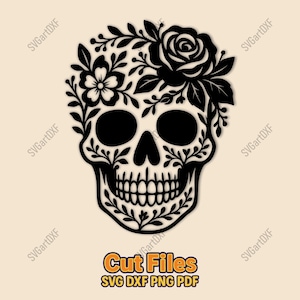 May include: Black skull design with floral elements, including a rose and other flowers, and leafy vines. The image includes the text "Cut Files" and file type options: SVG, DXF, PNG, and PDF. The design is set against a light beige background.