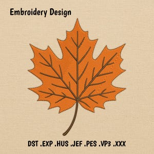 May include: An embroidered design of an orange maple leaf with brown veins and stem. The words "Embroidery Design" are at the top, and file formats are listed at the bottom. The leaf is centered on a beige background.