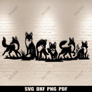 May include: Black metal fox family silhouette art piece. The artwork features six stylized foxes in various poses, set against a white brick wall. The foxes are depicted in a line, with some standing and others sitting. The bottom of the image has the text "SVG DXF PNG PDF".