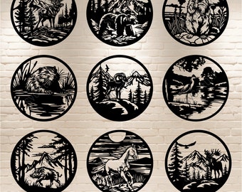 May include: Set of nine black and white circular designs featuring various animals and nature scenes. The designs include a deer, bear, groundhog, beaver, ram, heron, horse, and moose. Each design is set against a background of trees, mountains, and water.