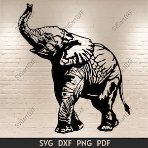 May include: Black and white silhouette of an elephant with its trunk raised in the air. The elephant is standing on all four legs and has a detailed design.