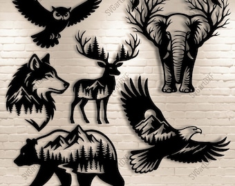 May include: Black metal cutouts of wildlife including an owl, wolf, deer, bear, elephant, and eagle. Each animal features mountain and tree designs. The text "SVG DXF PNG PDF" is at the bottom.