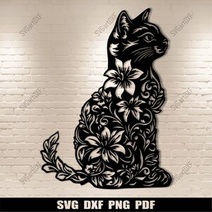 May include: Black silhouette of a cat with intricate floral designs, creating a decorative pattern. The cat is sitting with its tail curled around its body.