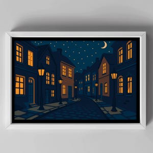 May include: A framed print depicting a nighttime street scene. The illustration features buildings with lit windows and street lamps along a cobblestone road under a starry sky and crescent moon. The color palette includes blues, oranges, and yellows.