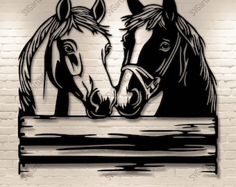 May include: Black and white silhouette of two horses' heads looking at each other, with their noses touching. The horses are framed by a wooden fence with three horizontal rails.