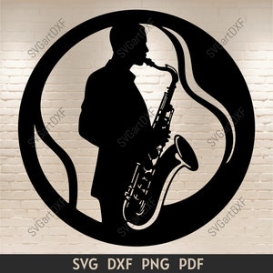 May include: Black and white silhouette of a person playing a saxophone in a circle. The person is facing right and the saxophone is angled upwards. The background is a white brick wall.