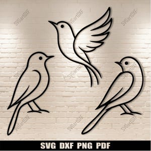 May include: Black line art of three birds in different poses against a white brick wall. One bird is in flight with outstretched wings, while the other two are perched. The image includes the text "SVG DXF PNG PDF".